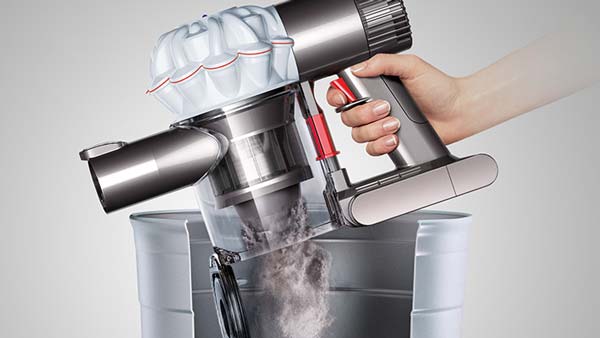 image of Dyson V6 Vacuum emptying dustbin