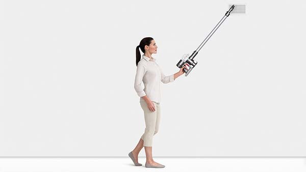 image of woman cleaning with Dyson V6 Vacuum