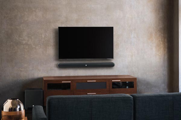 Image of SB 450 mounted on wall beneath television.
