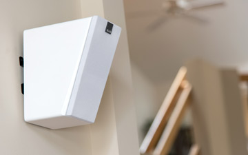 image of Elevate speaker mounted high on the wall.