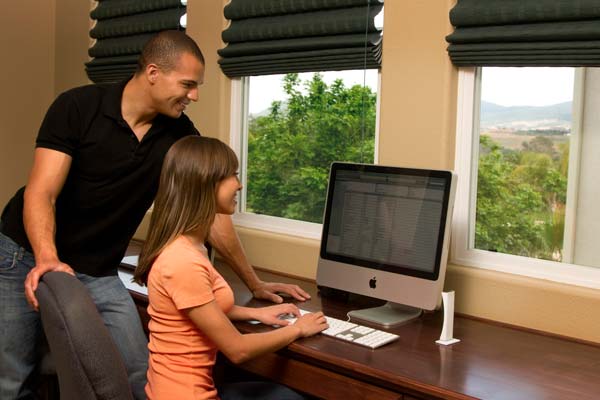 Image of UAT near computer.